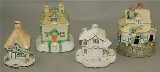Four Staffordshire porcelain models of cottages, c.1835-50, height 9.5 - 11cm